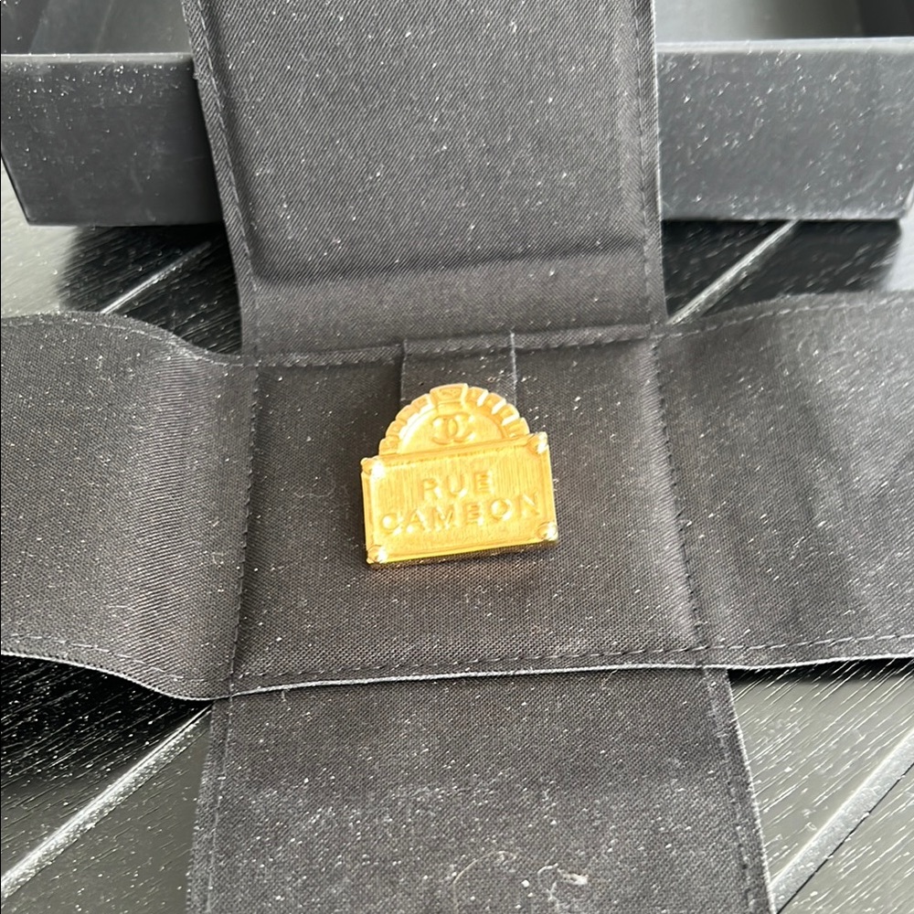 Elegant Chanel Gold Rue Cambon Brooch